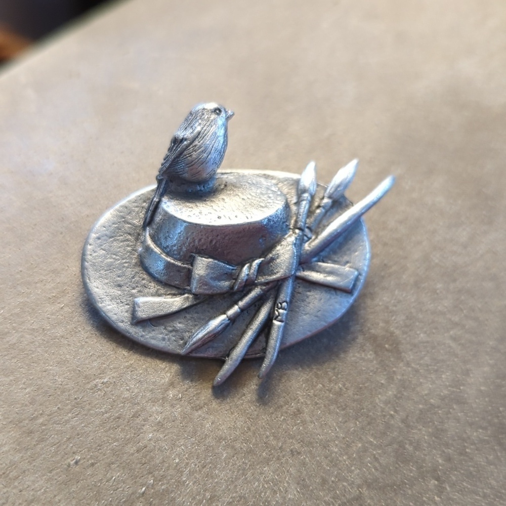 Marjalene Bastian Brooch Pin Pewter Hat Artist Bird Paint Brushes Design Art